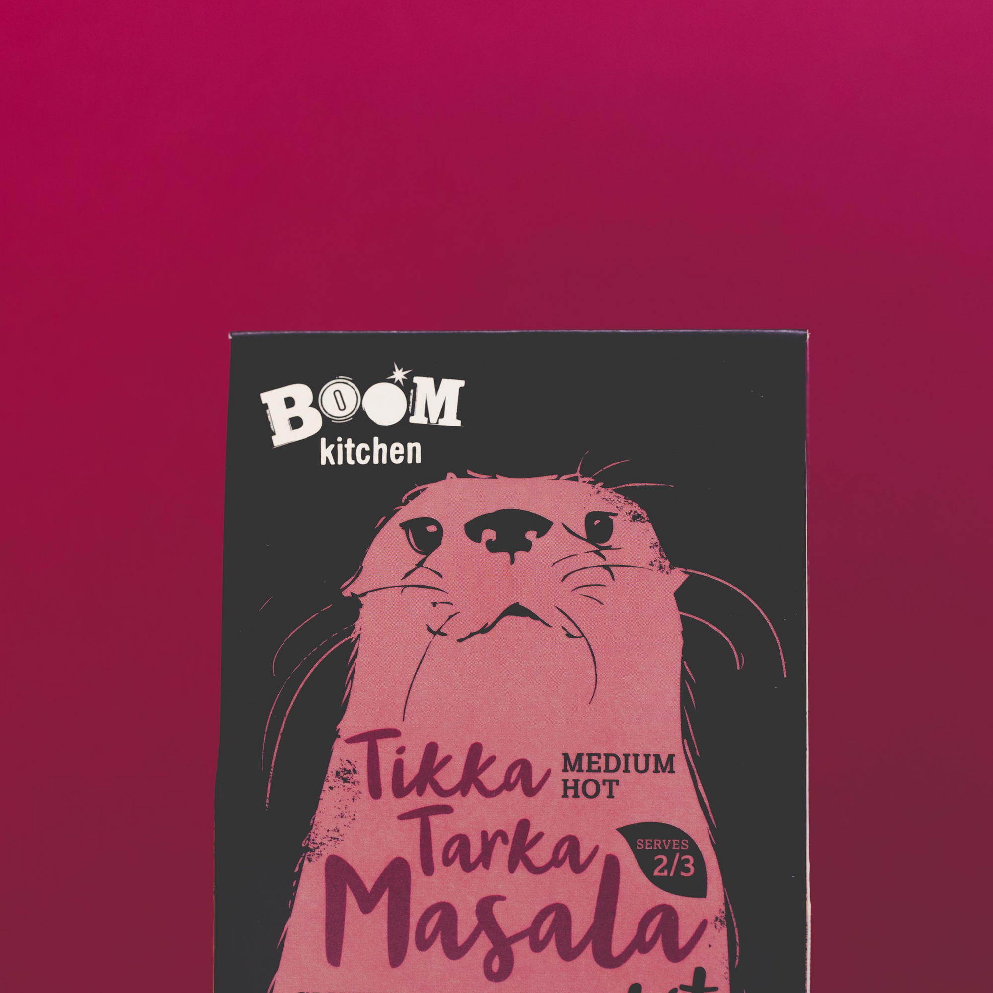 Boom Kitchen's Tikka Tarka Masala curry kit on a maroon background